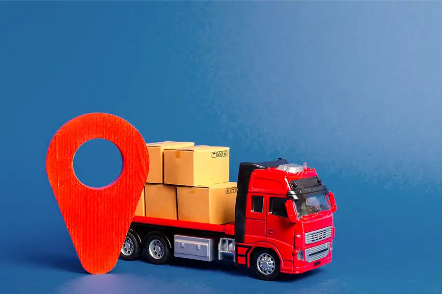 Gestión Logística Gestión logística para el transporte y la entrega de mercancías, con un camión de juguete y un pin de ubicación.